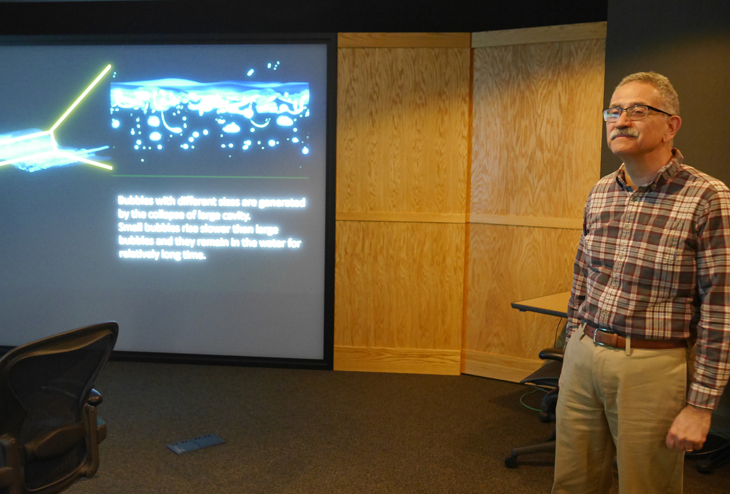 man stands in visualization lab